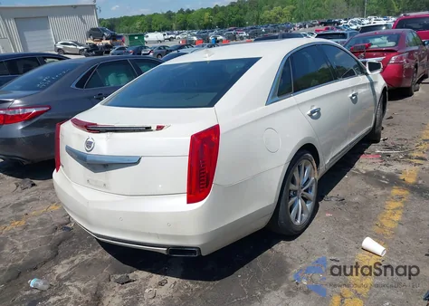 2014 Cadillac Xts Luxury from USA, damaged, VIN 2G61M5S32E9310910